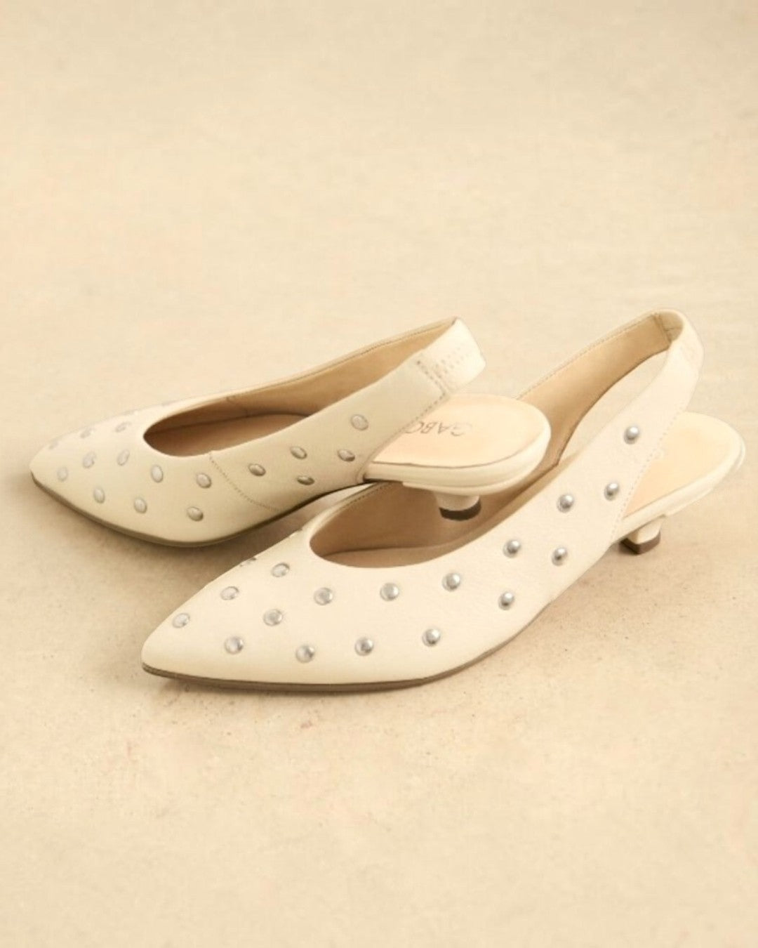 LUMINOUS ELEGANCE & GERMAN CRAFTSMANSHIP: STUDDED SLINGBACK PUMPS (WHITE)