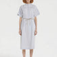 ARCHITECTURAL SILHOUETTE AND URBAN COOL: THE STRETCH COTTON DRESS
