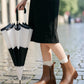 STEP INTO THE RAIN WITH CHIC CONFIDENCE