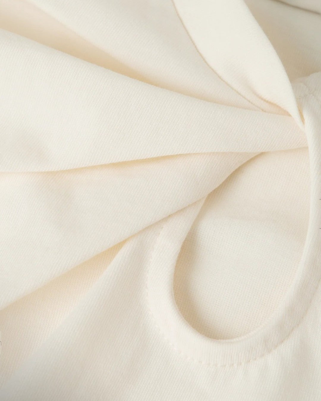 ELEGANCE IN A TWIST: TWISTED NECKLINE T-SHIRT