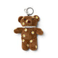 WOUF Choco Bear ブラウンのベアバッグチャーム正面、デイジー刺繍とパール調ロゴネックレス、クリップとキーリング