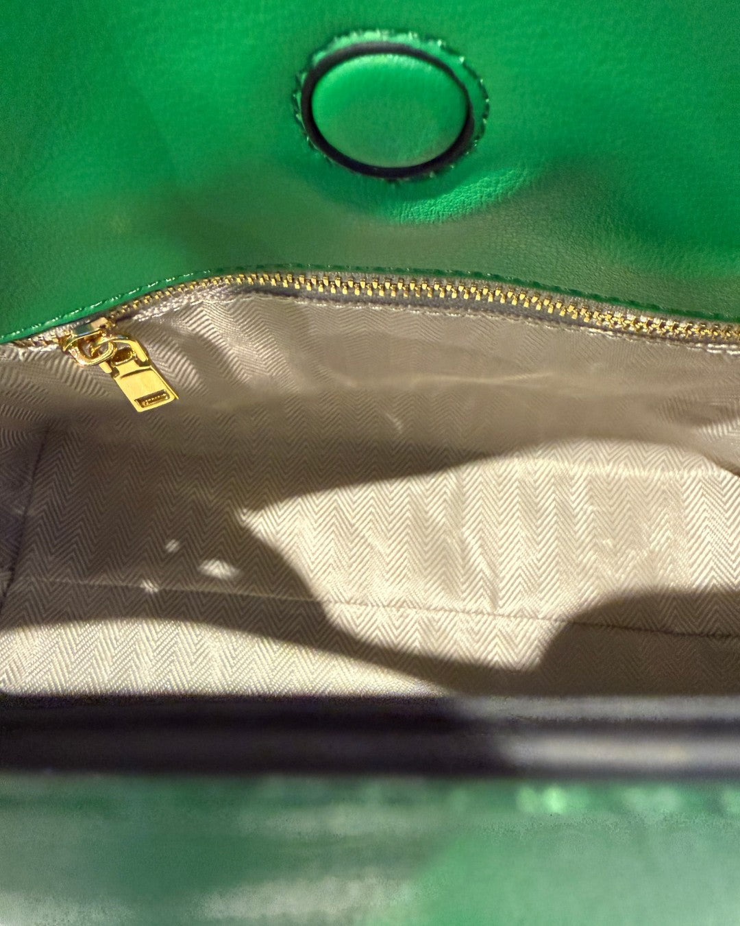 SILKEN TOUCH & TIMELESS KNOT: NAPPA LEATHER DRAWSTRING CLUTCH BAG
