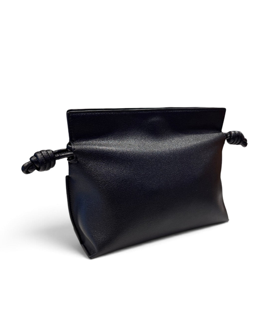 SILKEN TOUCH & TIMELESS KNOT: NAPPA LEATHER DRAWSTRING CLUTCH BAG