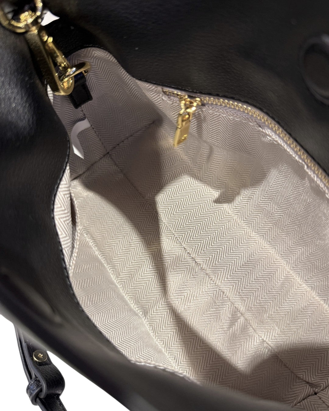 SILKEN TOUCH & TIMELESS KNOT: NAPPA LEATHER DRAWSTRING CLUTCH BAG