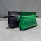 SILKEN TOUCH & TIMELESS KNOT: NAPPA LEATHER DRAWSTRING CLUTCH BAG