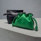 SILKEN TOUCH & TIMELESS KNOT: NAPPA LEATHER DRAWSTRING CLUTCH BAG