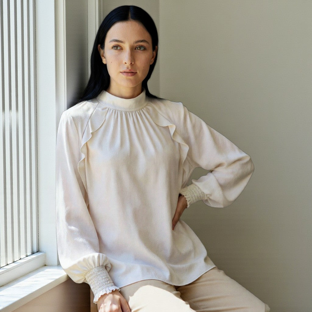 The Ivory Whisper: A Ruffled Dream Blouse